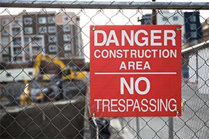 Construction site no trespassing sign